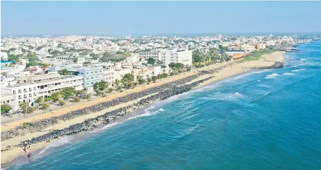  ?? ?? Aerial photograph shows the old French quarter known as “La Ville Blanche” or “White Town” along a beach in Puducherry.