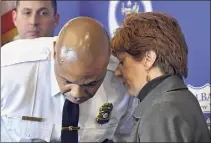  ?? Will Waldron / Times Union ?? Albany Police Chief Eric Hawkins listens to Mayor Kathy Sheehan during a news conference to address an alleged assault by Albany officers April 2, 2019.