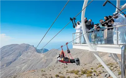  ??  ?? FAST SHOW: Adrenaline thrills on the zipline in the Jebel Jais mountains where daredevils can reach speeds of 90mph