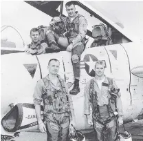  ?? PHOTO: REUTERS ?? Serving his country . . . John McCain (bottom right) poses with his US Navy squadron in 1965.
