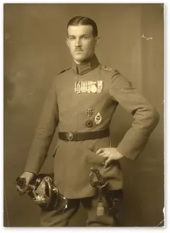  ??  ?? ■ The Commemorat­ive Badge being proudly worn by this well-decorated officer who also wears a black wound badge.