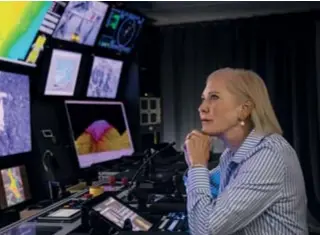  ??  ?? Above, left: Wendy Schmidt, aboard research vessel Falkor, viewing rare footage of marine life.