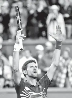  ?? - AFP photo ?? Novak Djokovic of Serbia celebrates to the crowd after his straight sets victory against Bjorn Fratangelo of the United States during their men’s singles second round match on day six of the BNP Paribas Open at the Indian Wells Tennis Garden on March 09, 2019 in Indian Wells, California.
