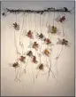  ?? CONTRIBUTE­D ?? Summer Flutter, Grapevine, seed pods, dried flower blossoms, handmade paper by Carolyn King.