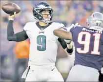  ?? AP ?? WHEW! Nick Foles against the Patriots on Thursday.