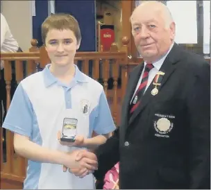  ??  ?? MARCHING ON ... Jack Bird receives his winners medal in the event at York BC