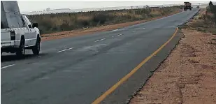  ??  ?? KILLING GROUND: Above and top, the state of the 13km stretch of the R25 on which the taxi and truck collided