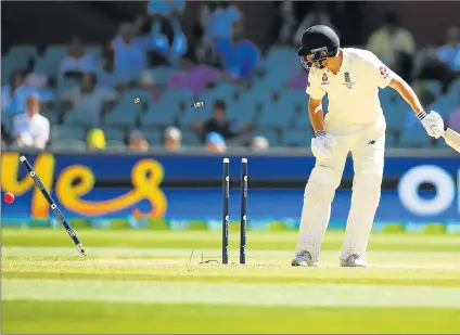  ?? Picture: GETTY IMAGES ?? LEFT STUMPED: England’s Jonny Bairstow is bowled by Mitchell Starc of Australia during day five of the second Test match in their Ashes Test series at Adelaide Oval in Australia yesterday