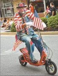  ?? Agnes Hagin/ SJ ?? The antics of Shriners are always a crowd pleaser as they show skills during the parade down Marble Street.