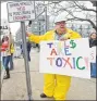  ?? Hearst Conn. Media file photo ?? Mike Johnson, of New Canaan, joins with others from the antitoll group No Tolls CT, during a February protest in Stamford against toll plans in Connecticu­t.