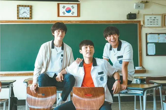  ?? Courtesy of Wavve ?? Actors Park Ji-hoon, right, and Choi Hyun-wook, center, play the lead characters in Wavve’s new original series, “Weak Hero Class 1.”