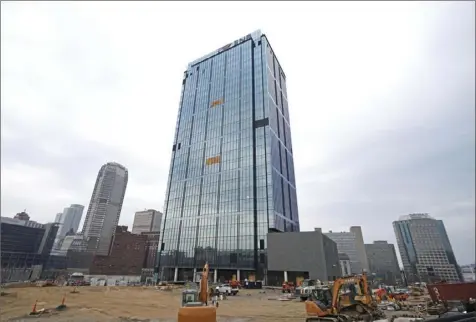  ?? Sebastian Foltz/Post-Gazette ?? The new FNB Financial Center building at 632 Washington Place in the Hill District, seen Friday, is nearing completion.