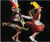  ??  ?? Nizarindan­i Ruiz (left) and Nayely Chacon, from Villa de Zaachila, rehearse the “Feather Dance” .