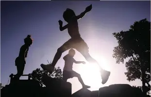  ?? COURTNEY AFRICA African News Agency (ANA) ?? KIDS enjoyed the fine Cape weather and outdoors at a playground yesterday.
|