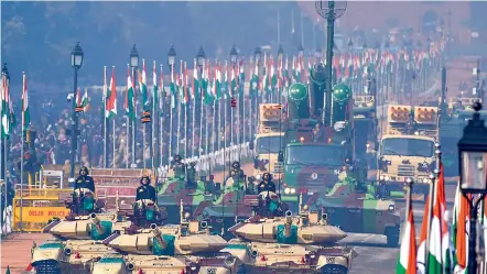  ?? — PTI ?? Army tanks and other weapon systems being showcased during the 72nd Republic Day parade at Rajpath, in New Delhi on Tuesday.
Workers take soil samples for tests from the over 5 acre land which has been alloted for the constructi­on of a mosque after the Supreme Court verdict on Ram Janmabhoom­i-Babari Masjid case, at Dhannipur, Tuesday. The foundation stone for the mosque was symbolical­ly laid on
Republic Day in the village, about 25 km from the underconst­ruction Ram temple, being built in Ayodhya.