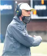  ?? STAFF PHOTO BY MATT HAMILTON ?? UTC football coach Rusty Wright argues a call during Saturday’s game against Mercer at Finley Stadium. UTC lost 35-28.