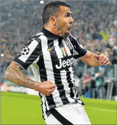  ?? Picture: GETTY IMAGES ?? A HOT STREAK: Carlos Tevez of Juventus celebrates as he scores during the Champions League semifinal first leg match on Tuesday night