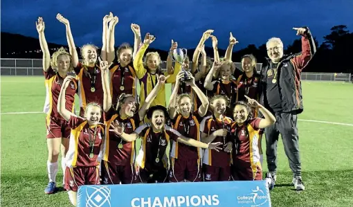  ??  ?? The Heretaunga College Girls First XI football team celebrate winning College Sport Wellington’s Regional Premier 2 competitio­n.