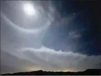  ?? PHOTO BY EMILY ANDELIN HUGHES ?? This weather phenomenon is known as a moon halo, storm ring, or a winter halo.