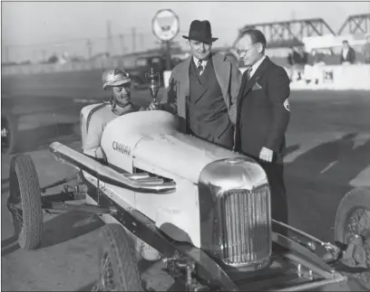  ?? PHOTO COURTESY OF THE LOUIE VERMEIL CLASSIC ?? Dewey Gatson, also known as Rajo Jack, sits in a car. He will be inducted into the Calistoga Speedway Hall of Fame on Friday at the Silver Dollar Fairground­s. Jack, who died in 1957, was one of the winningest drivers of the West Coast during the 1930s and 1940s.