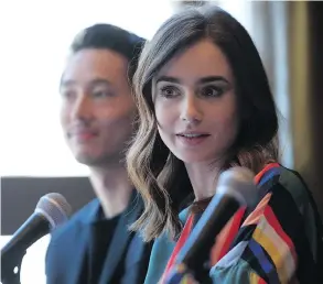  ?? JASON KEMPIN / GETTY IMAGES FOR NETFLIX ?? Actress Lily Collins speaks during the Okja press conference in New York. Collins plays an animal-rights activist in the Bong Joon-ho-directed film.