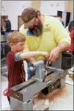  ?? LAUREN HALLIGAN — MEDIANEWS GROUP FILE ?? Seven-year-old Brighton Nielson makes a wooden pen at the 2018 Woodworker­s Showcase in Saratoga Springs.