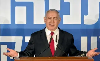  ?? AP ?? Israel’s attorney general yesterday recommende­d indicting Prime Minister Benjamin Netanyahu with bribery and breach of trust in a series of corruption cases, a momentous move that shook up Israel’s election campaign and could spell the end of the prime minister’s illustriou­s political career.