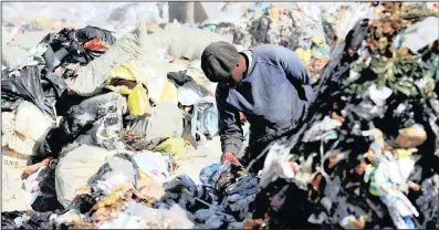  ??  ?? SCROUNGING: A man rummages through piles of rotting food and other rubbish at Robinson Deep landfill. Described as South Africa’s ‘shameful secret’, a whopping 10 million tons of food is binned each year. PICTURE:BHEKIKHAYA MABASO