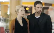  ?? PATRICK HARBRON/FX ?? Jennifer Finnegan as Molly, seen here with Adam Rayner
as Barry, star in the FX political thriller Tyrant.