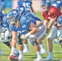  ?? Corey Sipkin ?? SNAP DECISION: Nick Gates, never a center in college, is in a battle with Spencer Pulley to be the Giants’ starting center.