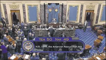  ?? Senate Television ?? The vote total of 50-49 on Senate passage of the COVID-19 relief bill is displayed Saturday on screen. Because of Senate changes to the bill, the legislatio­n goes back to the House.