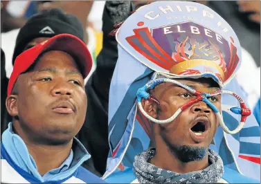  ?? Picture: BRIAN WITBOOI ?? LOYAL FANS: Fans sing to lift the spirit of the game during Chippa United’s Absa Premiershi­p match against Baroka Football Club at the Nelson Mandela Bay Stadium last night. Chippa scored an embarrassi­ng own goal as they faltered at home, going down...