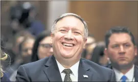  ?? JACQUELYN MARTIN — THE ASSOCIATED PRESS ?? Mike Pompeo laughs at a joke while he is introduced before the Senate Foreign Relations Committee during a confirmati­on hearing on his nomination to be secretary of state.