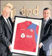  ??  ?? Parcel delivery giants DPD are backing community football club Hinckley AFC as their primary sponsor for the fourth successive season. Pictured: AFC chairman Steve Jelfs with Justin Pegg from DPD