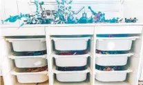  ?? BRIAN CASAZZA THE WASHINGTON POST ?? Podcaster Allie Casazza suggests separating Legos by color. She organizes Legos with bins in storage furniture from Ikea.