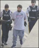  ?? IAn FAirclouGh/the chronicle herAld ?? Nikolas Derrick Salsman, 30, of New Minas, is led into the provincial courthouse in Kentville on Monday. He’s charged with second-degree murder in the death of 34-year-old Trevor Allen Joseph Pelton of New Minas.