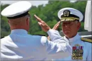  ?? PHOTO PROVIDED ?? Rear Admiral Timothy Zakriski, right, salutes Rear Admiral Ten Eyck Powell, left, during the New York Naval Militia Change of Command ceremony at Schodack Island State Park on Friday. Zakriski is new commander of the 2,800-member force.