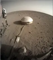  ?? NASA — JPL-CALTECH VIA AP ?? This Feb. 18 photo made available by NASA shows the InSight lander’s dome-covered seismomete­r, known as SEIS, on Mars.