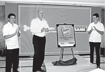  ?? CONTRIBUTE­D PHOTO ?? CLEANERGIZ­ED. (Left to right) UnionBank Director Luis Miguel Aboitiz, AboitizPow­er President and COO Antonio Moraza and UnionBank Chairman and CEO Justo A. Ortiz unveiled the Cleanergy marker at the lobby of UnionBank Plaza.
