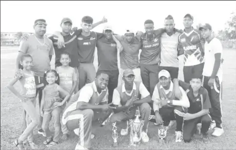  ??  ?? The new South Essequibo Cricket Committee T20 Chairman’s Cup champions, New Opportunit­y Corps along with chairman and sponsor, Andy Ramnarine and family.