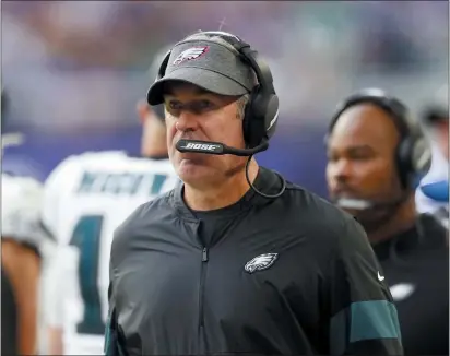  ?? JIM MONE — THE ASSOCIATED PRESS ?? Eagles head coach Doug Pederson watches from the sideline during Sunday’s loss to the Vikings.
