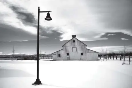  ??  ?? A barn sits on the 9.6-acre Bromley/Koizuma-Hishinuma Farm, which is listed on the National Register of Historic Places at 1594 E. Bromley Lane. Brighton purchased the farm in 2006 and saved the buildings there from the wrecking ball. Joe Amon, The...