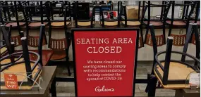  ?? AP FILE PHOTO BY DAMIAN DOVARGANES ?? In this file photo, an indoors sitting bar is closed inside the Gelson’s Market in Los Feliz neighborho­od of Los Angeles. Gov. Gavin Newsom on Sunday, June 28, 2020, ordered bars that have opened in seven California counties to immediatel­y close, saying the coronaviru­s was rapidly spreading in some parts of the state. The counties under the mandatory bar closure order are: Los Angeles, Fresno, San Joaquin, Kings, Kern, Imperial and Tulare.