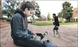  ?? CHRISTINA HOUSE Los Angeles Times ?? SHAYA NAIMI hangs out on the steps of UCLA’s Powell Library. The campus was “as empty as I’ve ever seen it on any school day,” another student said.