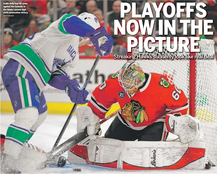  ?? GETTY IMAGES ?? Collin Delia had 40 saves against the Canucks in the Hawks’ season-high sixth consecutiv­e victory.