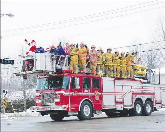  ?? COURTESY ?? Photo from a previous year’s toy drive. The campaign will continue this year with safety and sanitary measures in place.