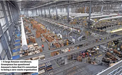  ?? ?? A large Amazon warehouse. Greenpeace has questioned Amazon’s claim that it’s committed to being a zero-waste organisati­on