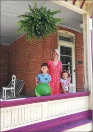  ?? SSPF ?? “I love this house! I can’t wait for it to be our home!” said Kasia Israel. She and her children Kai and Hannah on their recently opened front porch.