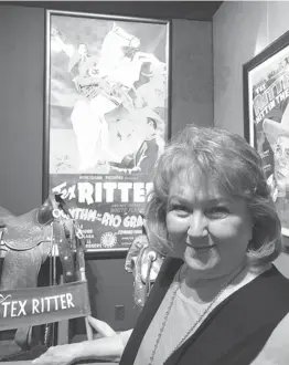  ?? Houston Chronicle via AP ?? Tommie Ritter Smith, director of the Tex Ritter Museum, remembers the popular singing cowboy as Uncle Tex. Housed in a red-brick building a few blocks off the square, the small museum was inspired by her cousin, the singing cowboy and movie star, Tex...