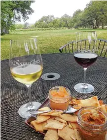  ?? Terry Scott Bertling / San Antonio Express-News ?? No trip to Fredericks­burg would be complete without a wine tour.